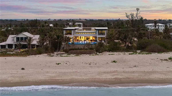 a view of a town with mountains in the background