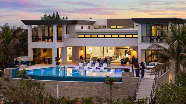 a view of a building with outdoor seating