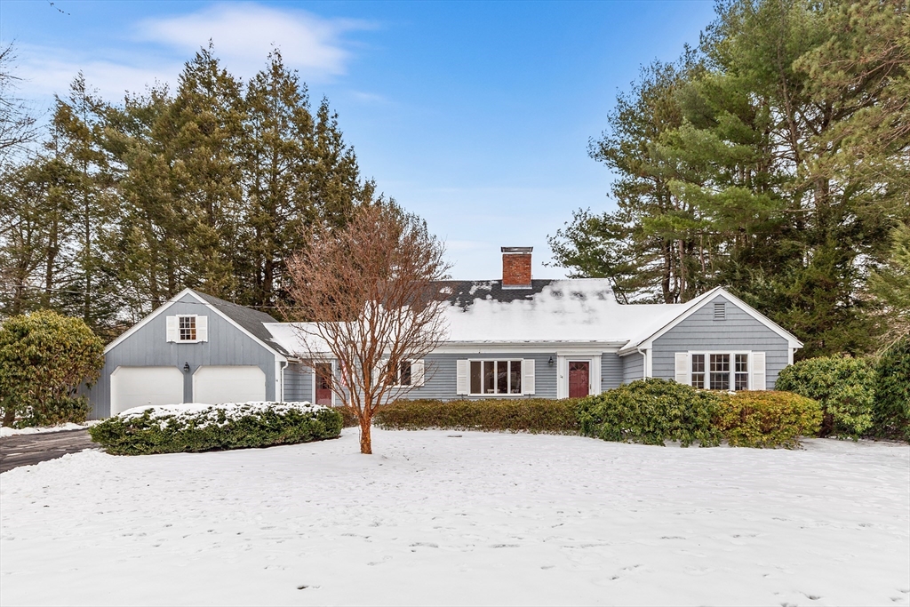 14 Griscom Road Sudbury, MA 01776 - Photo 1 of 32 a front view of a house with a yard