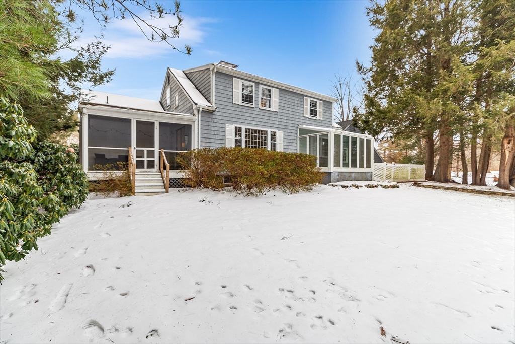 14 Griscom Road Sudbury, MA 01776 - Photo 28 of 32 a front view of a house with a yard