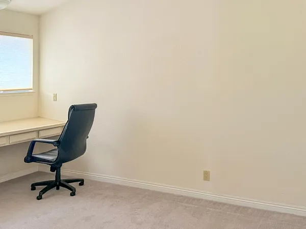 a work place with table and chairs