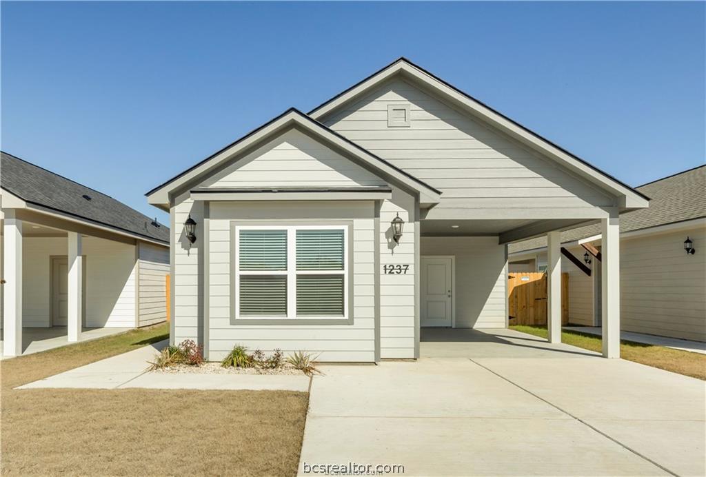 1249 Storm Row Lane Bryan, TX 77803 - Photo 2 of 20 a front view of a house