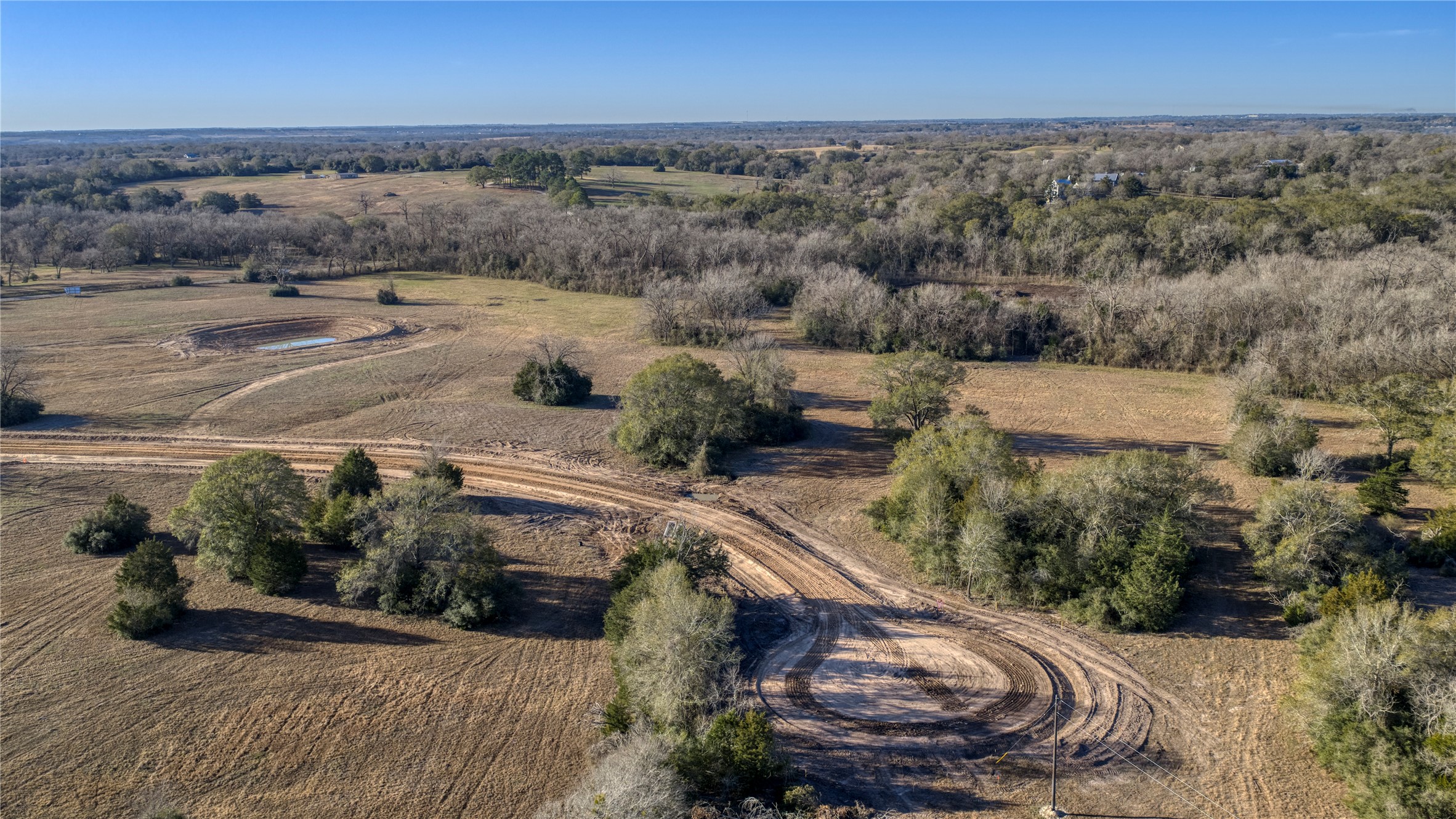 2 Creekview Trail Brenham, TX 77833 - Photo 2 of 4 a view of a city street view