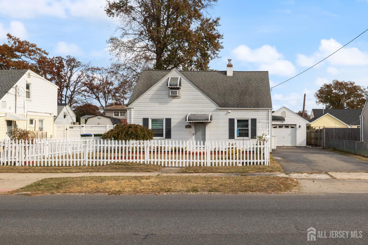185 Plainfield Avenue Edison, NJ 08817 - Photo 2 of 30 a front view of a house with a garden