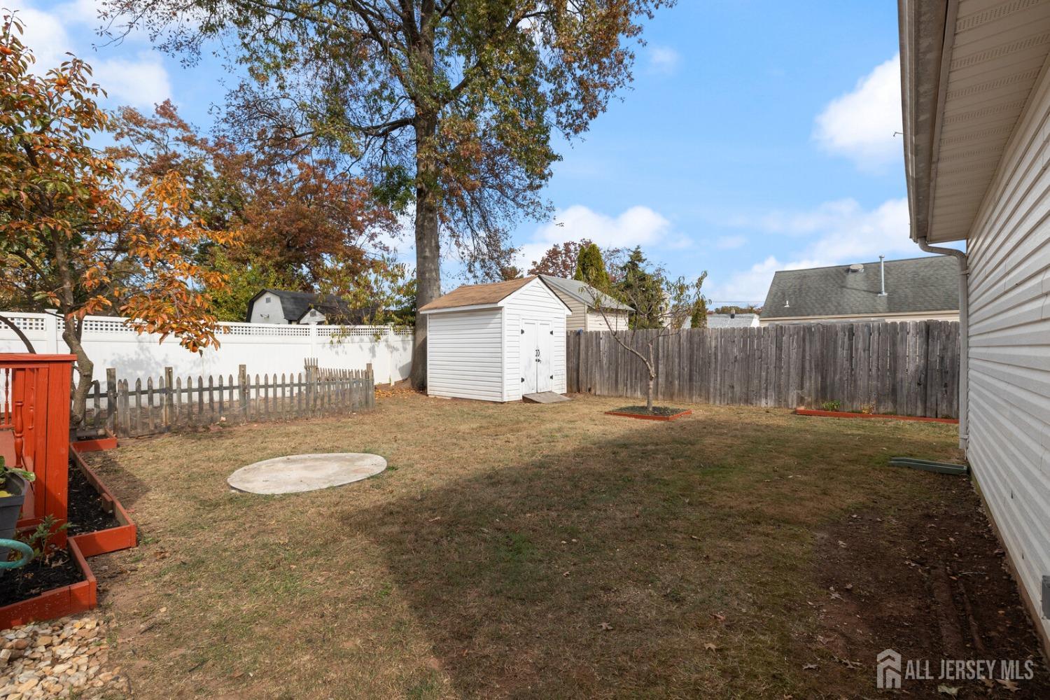 185 Plainfield Avenue Edison, NJ 08817 - Photo 26 of 30 a view of a backyard of the house