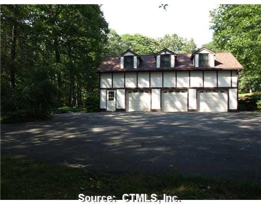 35 1/2 Old Bridge Road Brookfield, CT 06804 - Photo 1 of 1 a view of house with backyard