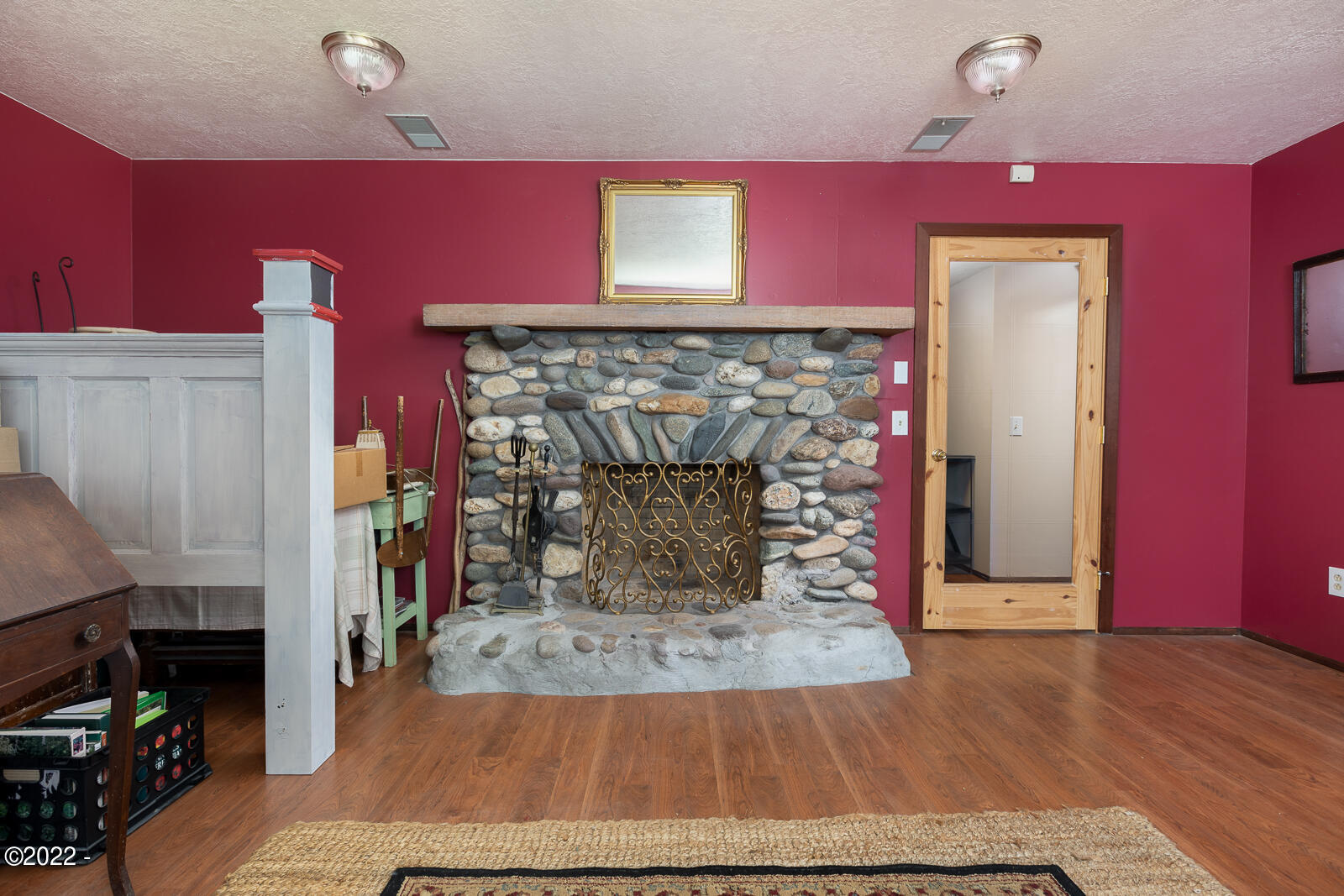 3131 Northeast Johns Loop Neotsu, OR 97364 - Photo 24 of 38 Fire place in lower level bonus room