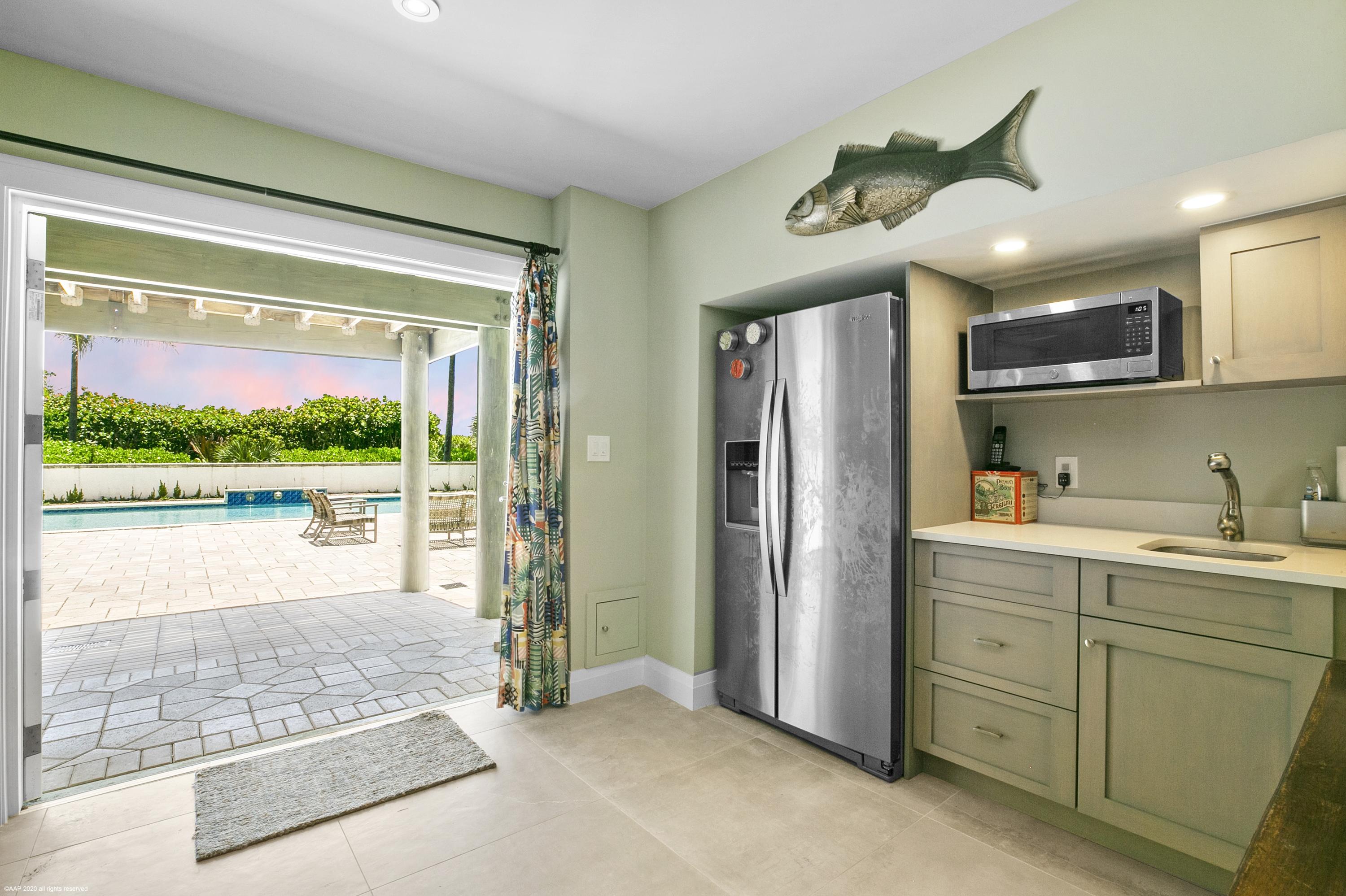 130 North Beach Road Hobe Sound, FL 33455 - Photo 18 of 25 Family room and cabana