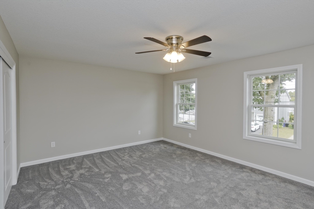 82 Judson Street Springfield, MA 01104 - Photo 24 of 38 a view of an empty room with a window