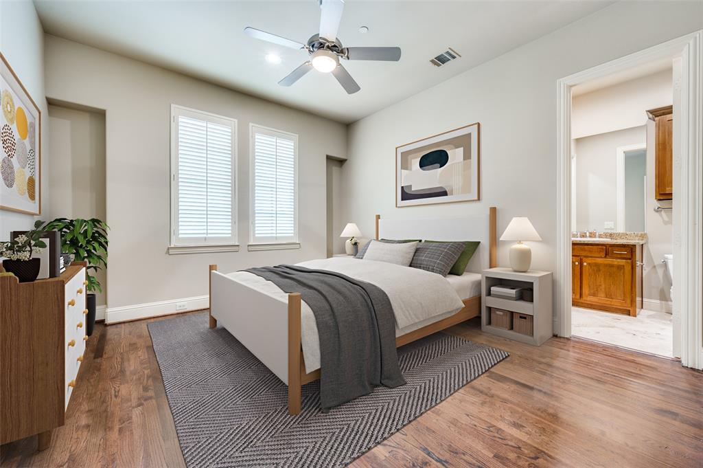 14725 Stanford Court Addison, TX 75254 - Photo 13 of 25 a spacious bedroom with a large bed and a chandelier