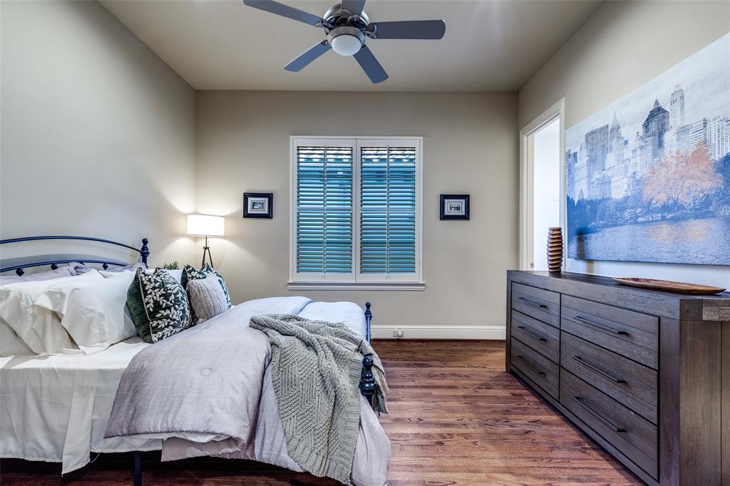 14725 Stanford Court Addison, TX 75254 - Photo 17 of 25 a bedroom with a bed and a window