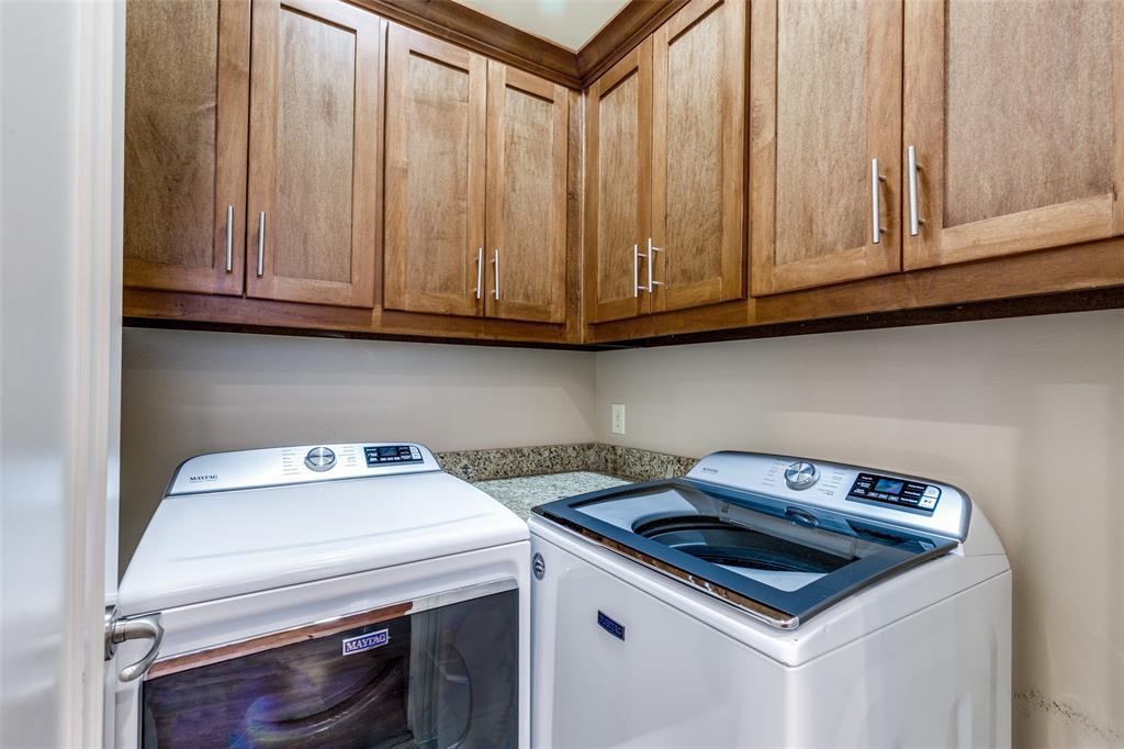 14725 Stanford Court Addison, TX 75254 - Photo 19 of 25 a utility room with dryer and washer