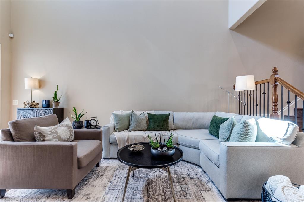 14725 Stanford Court Addison, TX 75254 - Photo 3 of 25 a living room with furniture and a potted plant
