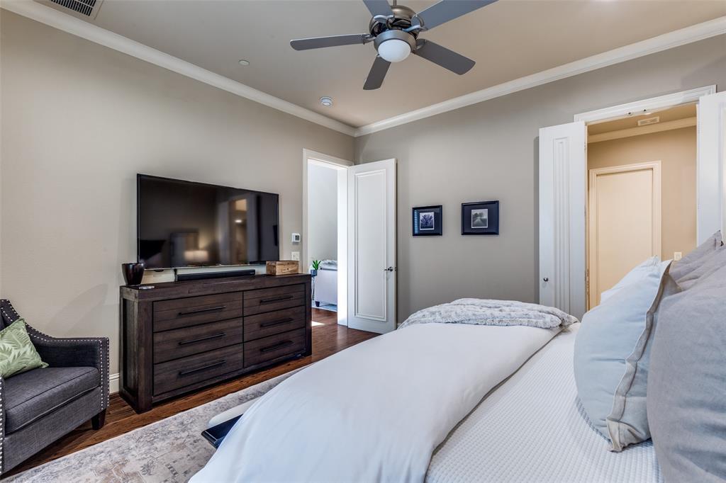 14725 Stanford Court Addison, TX 75254 - Photo 10 of 25 a bedroom with a bed and a television