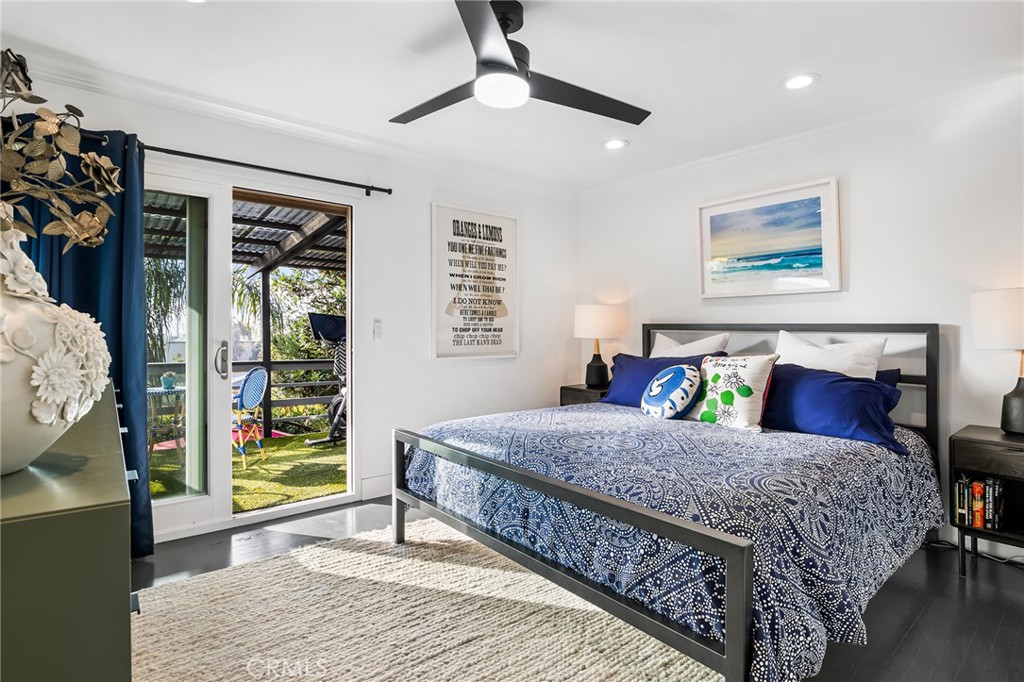 736 Griffith Place Laguna Beach, CA 92651 - Photo 13 of 24 a living room with a bed furniture and painting on the wall