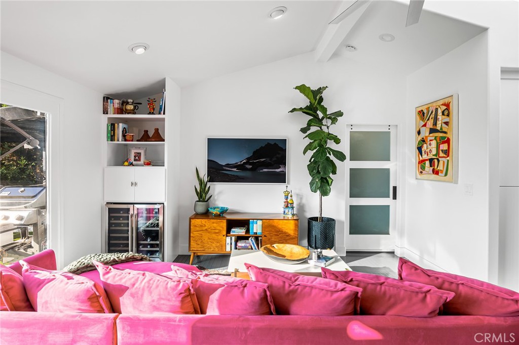 736 Griffith Place Laguna Beach, CA 92651 - Photo 2 of 24 a living room with furniture and a flat screen tv