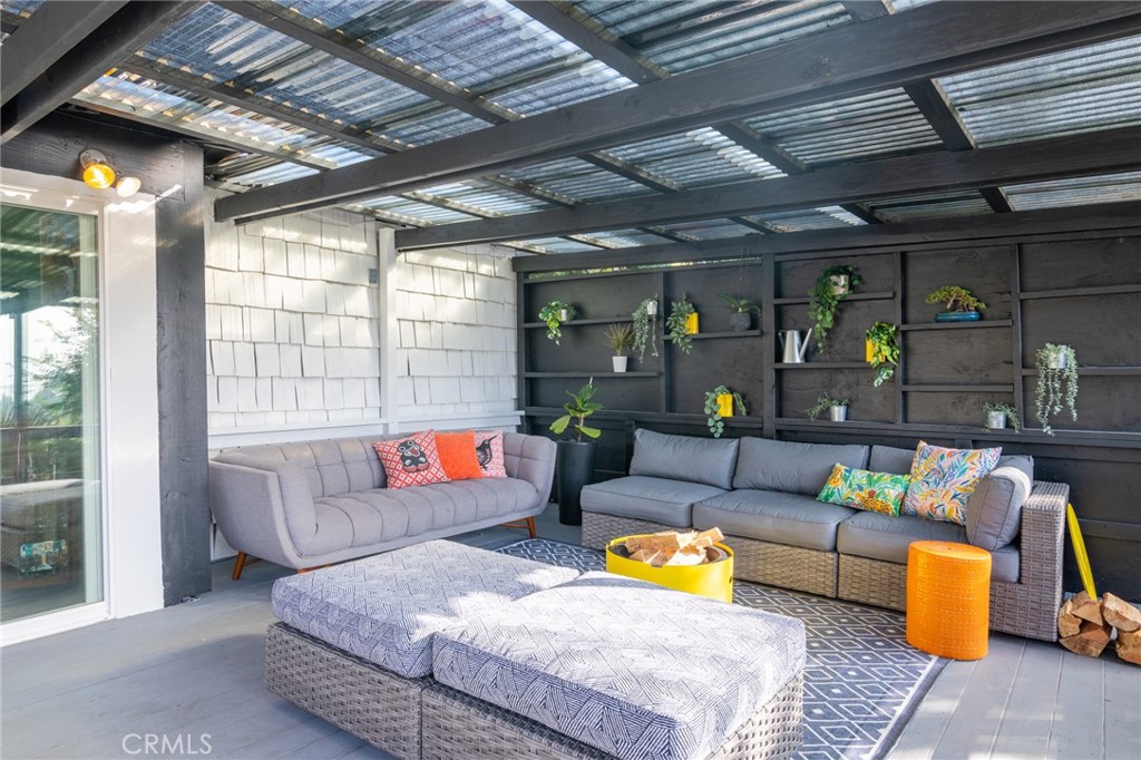 736 Griffith Place Laguna Beach, CA 92651 - Photo 9 of 24 a outdoor living space with furniture and a fireplace