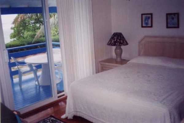 7224 Alamoo Road Hanalei, HI 96714 - Photo 6 of 9 a view of a room that has a bed and a mirror