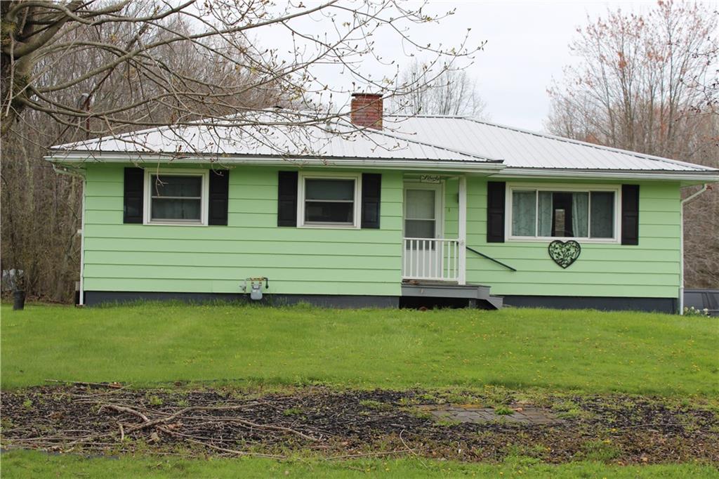 1287 Franklin Road Jackson Center, PA 16133 - Photo 1 of 21 a view of a house with a garden
