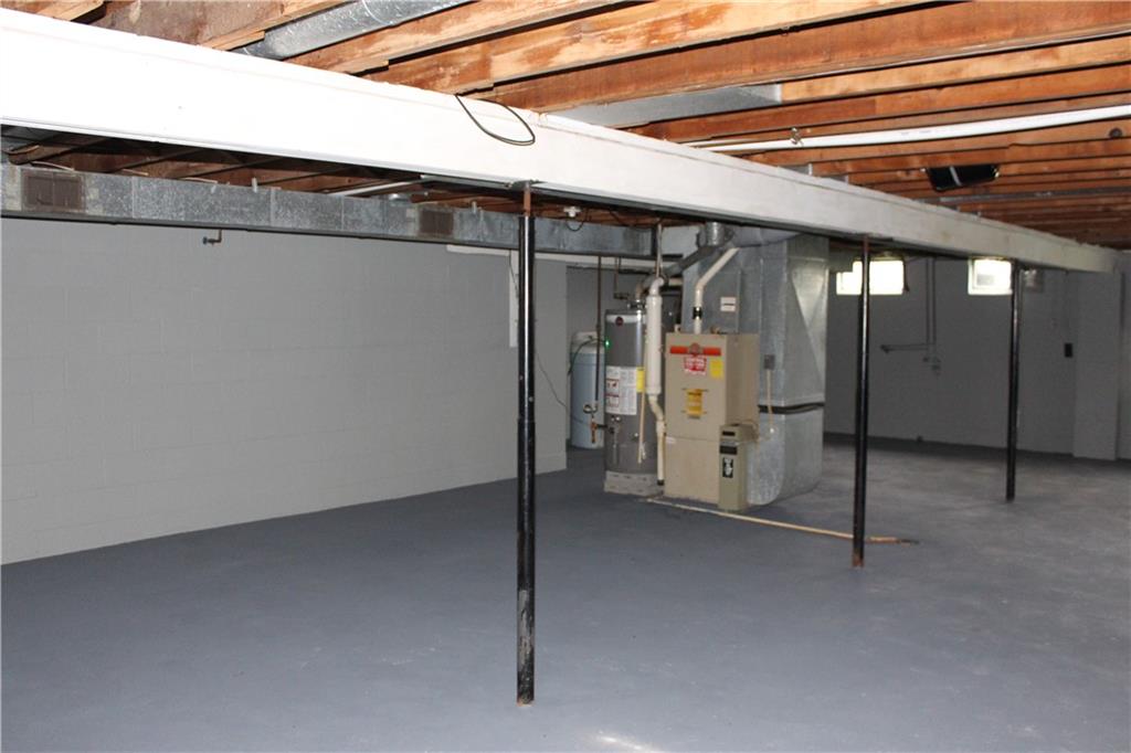 1287 Franklin Road Jackson Center, PA 16133 - Photo 13 of 21 a view of a room with wooden walls