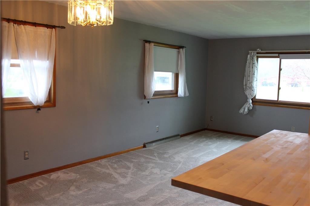 1287 Franklin Road Jackson Center, PA 16133 - Photo 4 of 21 an empty room with windows