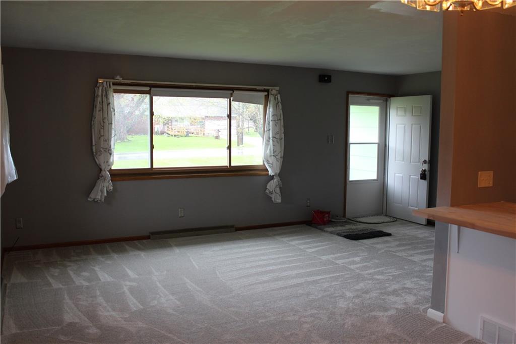 1287 Franklin Road Jackson Center, PA 16133 - Photo 5 of 21 an empty room with windows