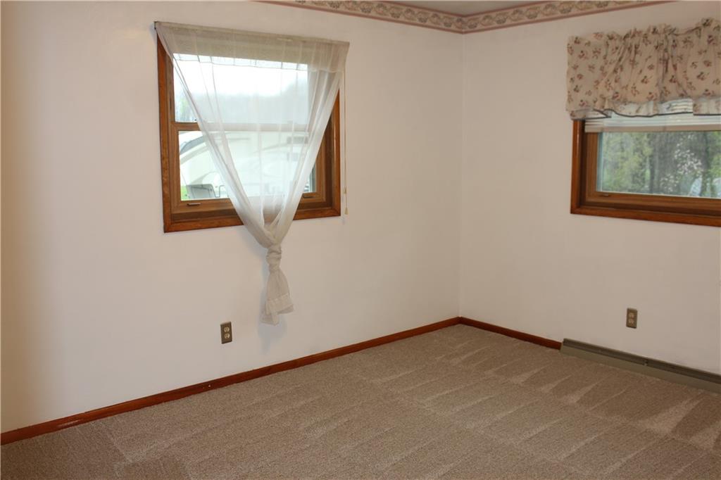 1287 Franklin Road Jackson Center, PA 16133 - Photo 10 of 21 an empty room with a window