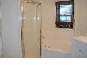 1110 Santa Rosa Boulevard, Unit B100 Fort Walton Beach, FL 32548 - Photo 20 of 27 a bathroom with a tub and a sink
