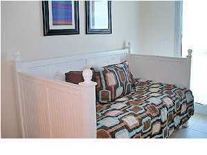 1110 Santa Rosa Boulevard, Unit B100 Fort Walton Beach, FL 32548 - Photo 24 of 27 a black and white photo of a bedroom