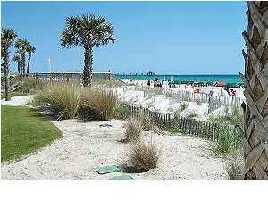 1110 Santa Rosa Boulevard, Unit B100 Fort Walton Beach, FL 32548 - Photo 7 of 27 a view of a lake with a beach