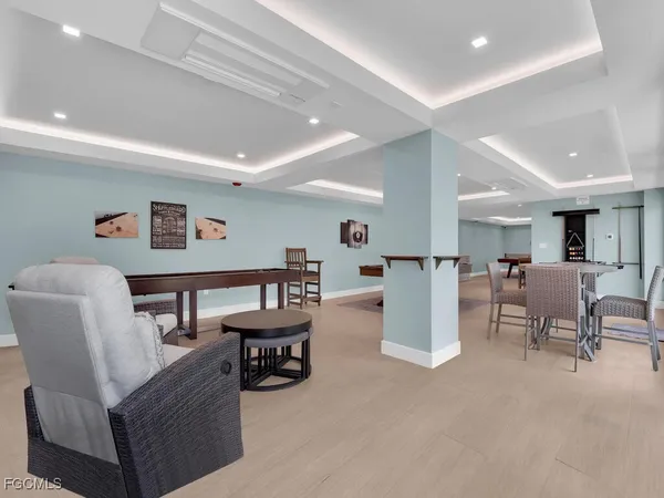 a living room with furniture and a table