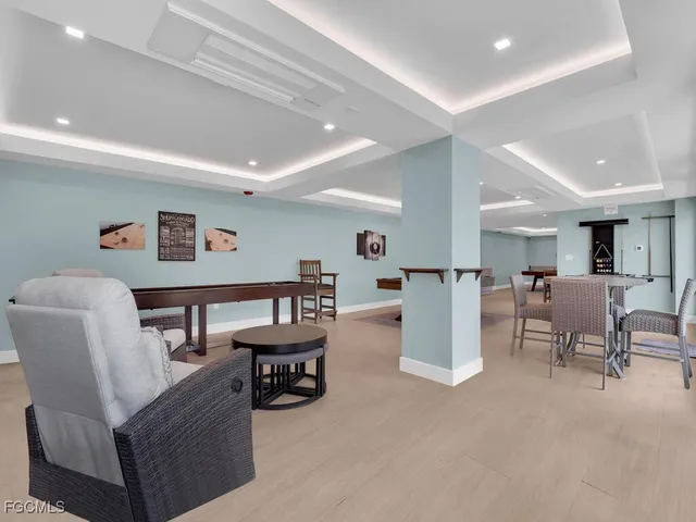 a living room with furniture and a table