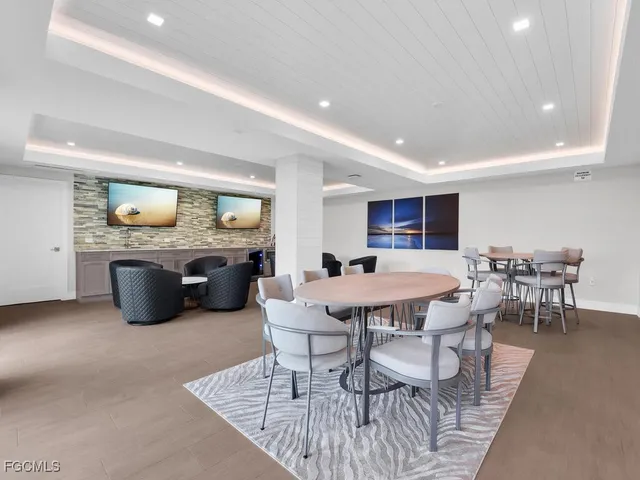 a view of a dining room with furniture