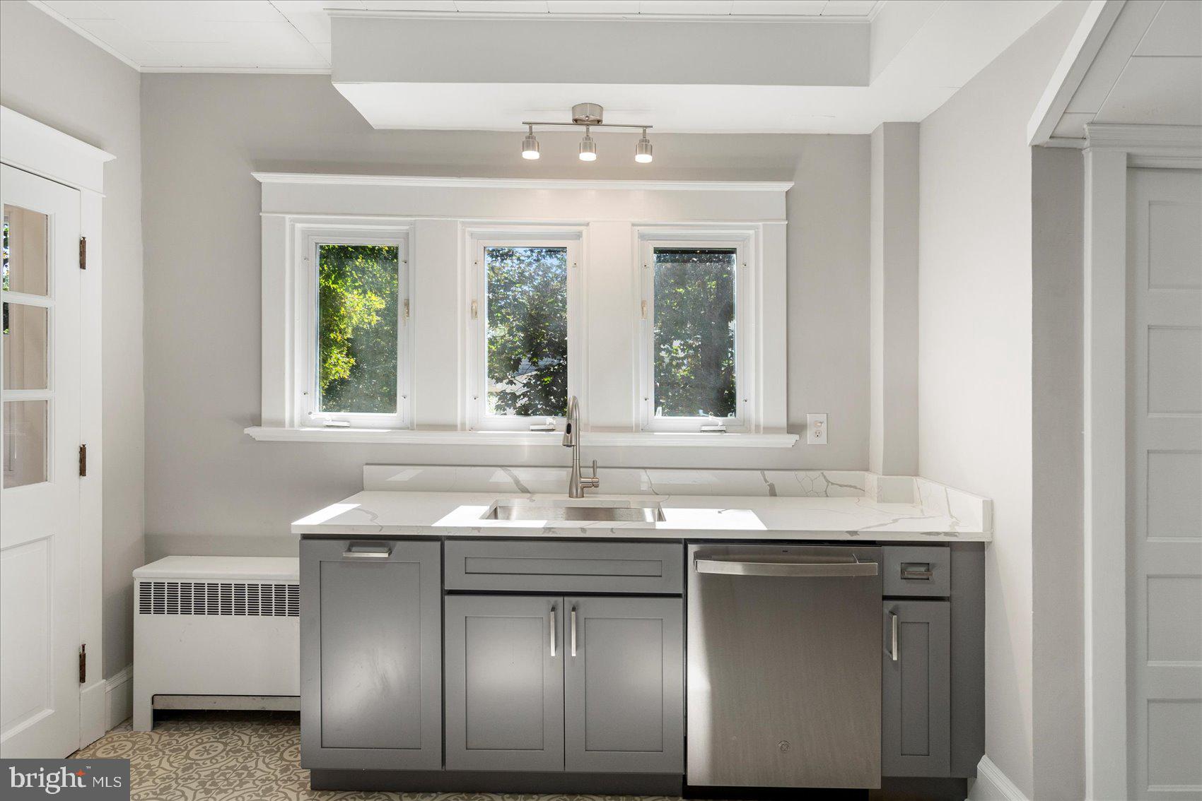 15317 York Road Sparks Glencoe, MD 21152 - Photo 11 of 47 a bathroom with a sink and a window
