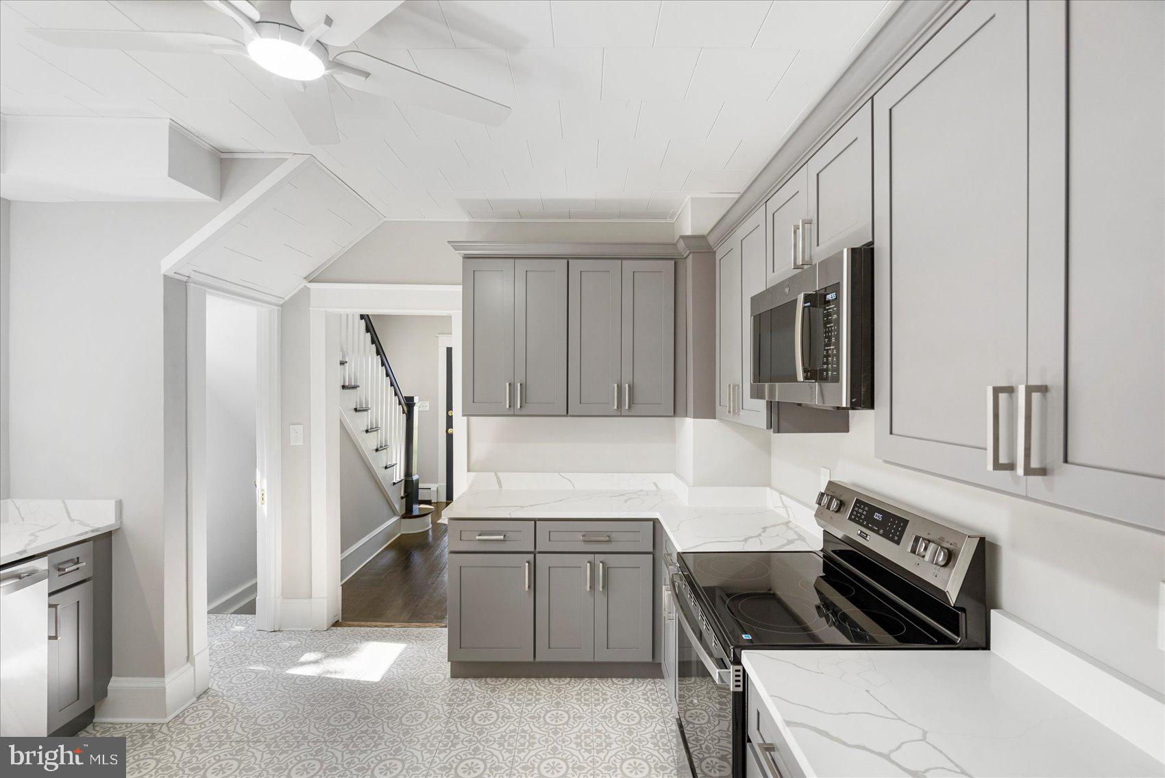 15317 York Road Sparks Glencoe, MD 21152 - Photo 13 of 47 a kitchen that has a sink and a stove