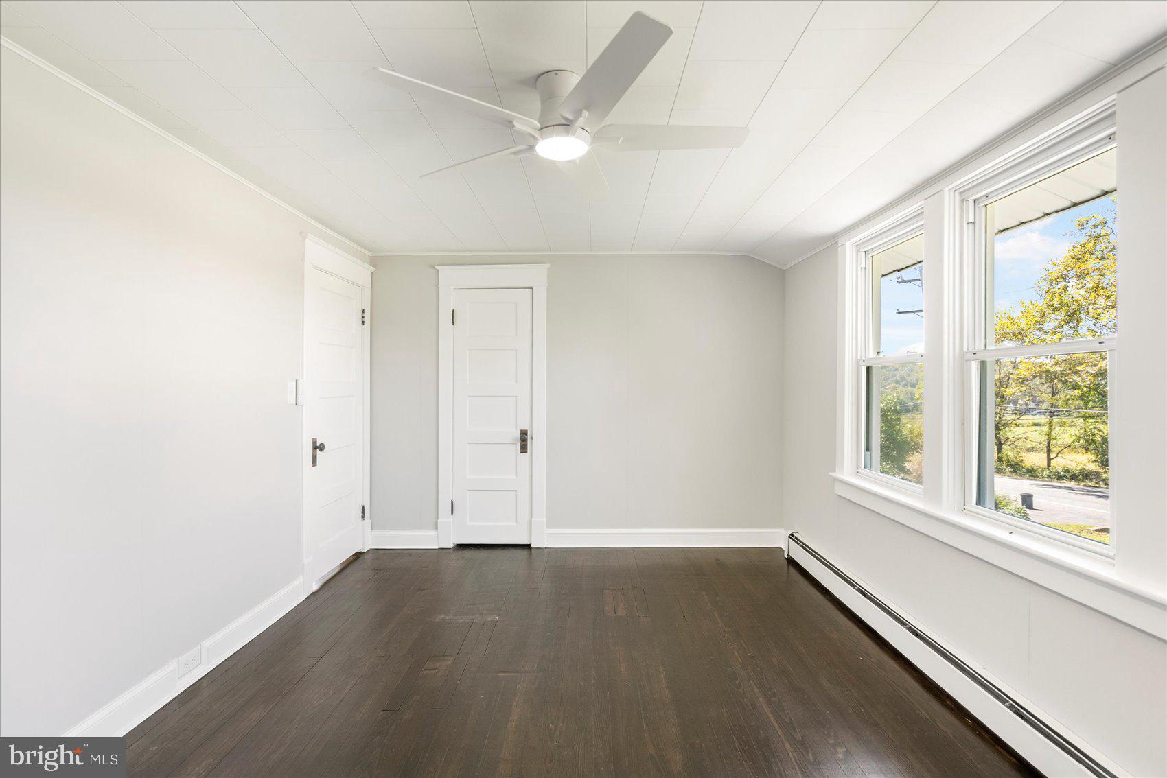 15317 York Road Sparks Glencoe, MD 21152 - Photo 25 of 47 wooden floor in an empty room with a window