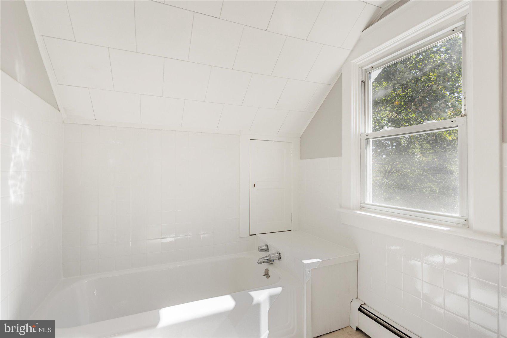 15317 York Road Sparks Glencoe, MD 21152 - Photo 30 of 47 a bathroom with a bathtub and a shower