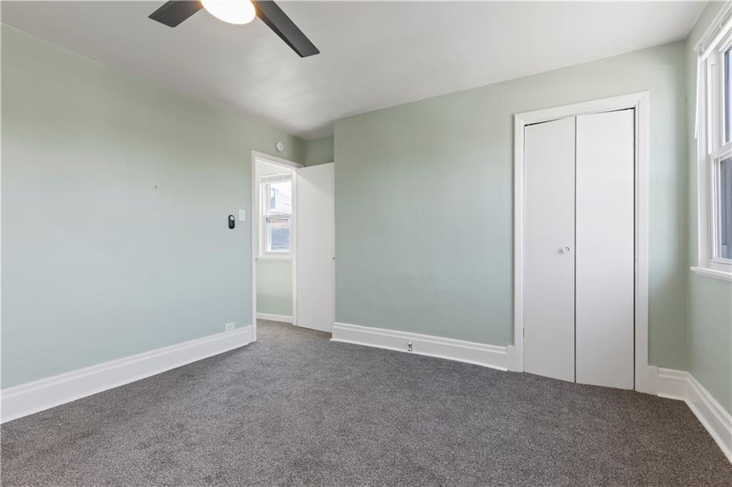 411 Edith Street Pittsburgh, PA 15211 - Photo 17 of 31 an empty room with closet and windows