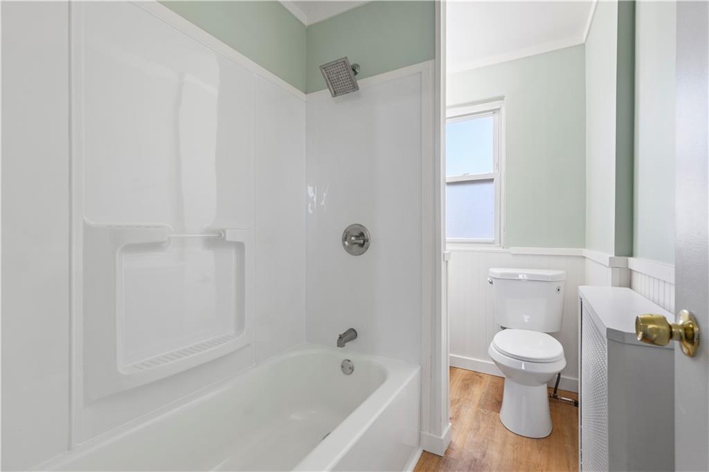 411 Edith Street Pittsburgh, PA 15211 - Photo 19 of 31 a bathroom with a toilet and a shower