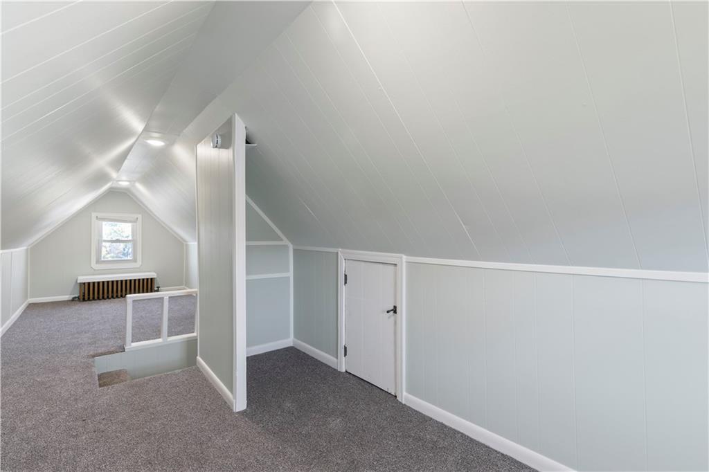 411 Edith Street Pittsburgh, PA 15211 - Photo 26 of 31 a view of an empty room with wooden floor and a window