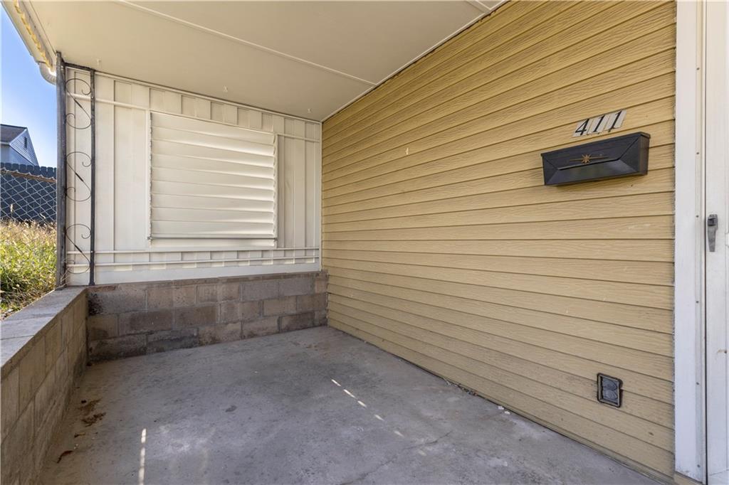 411 Edith Street Pittsburgh, PA 15211 - Photo 27 of 31 a view of an empty room with a window