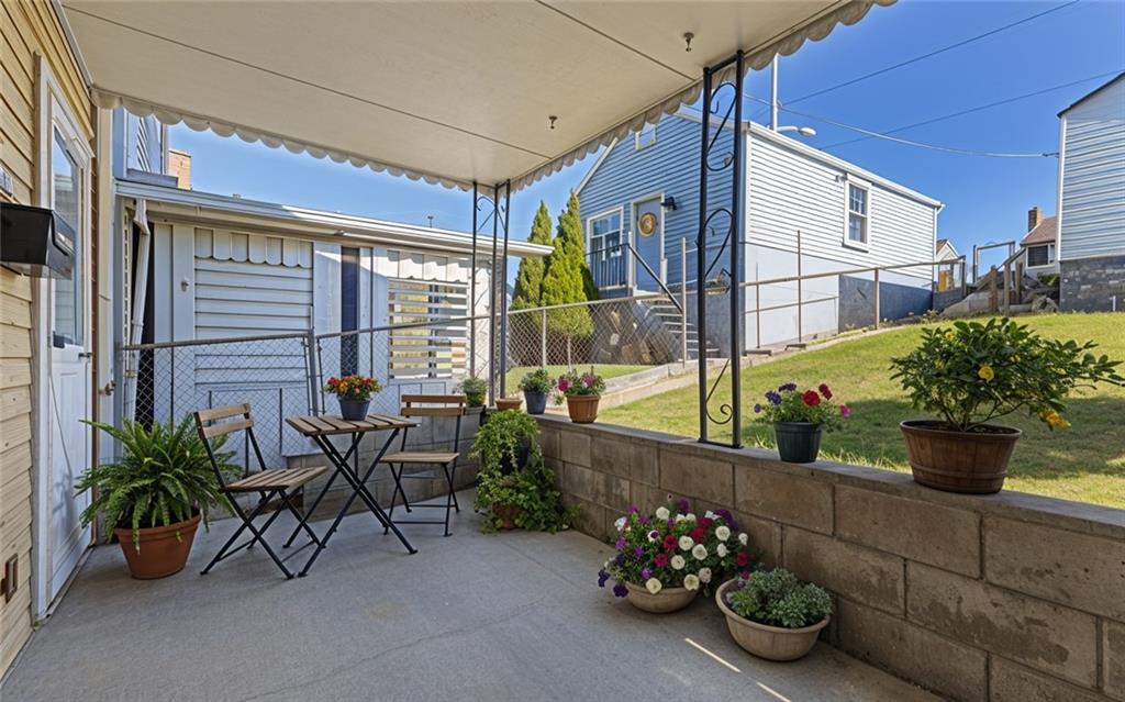 411 Edith Street Pittsburgh, PA 15211 - Photo 28 of 31 a view of a chairs and table in a patio