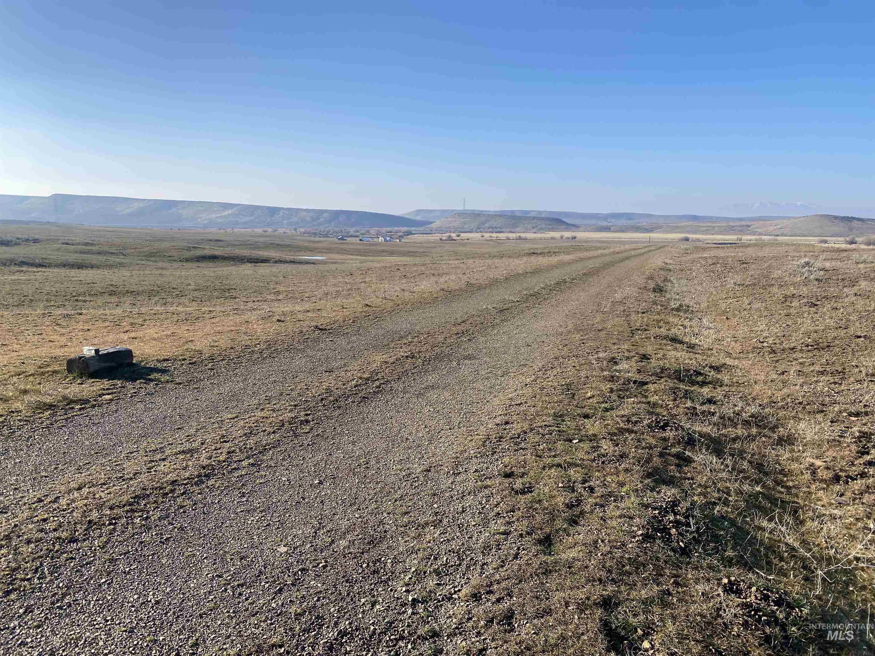 View of road featuring a mountain view and a view of countryside