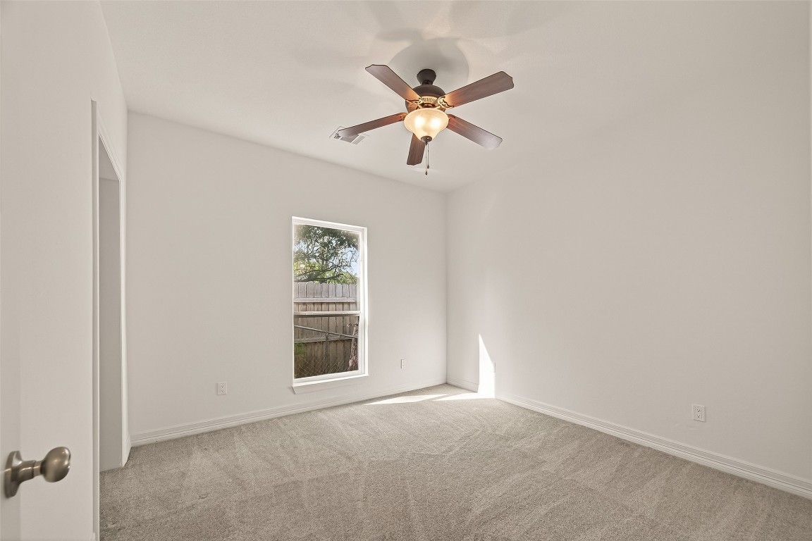 2609 Boss Street La Marque, TX 77568 - Photo 17 of 33 a view of an empty room with a window