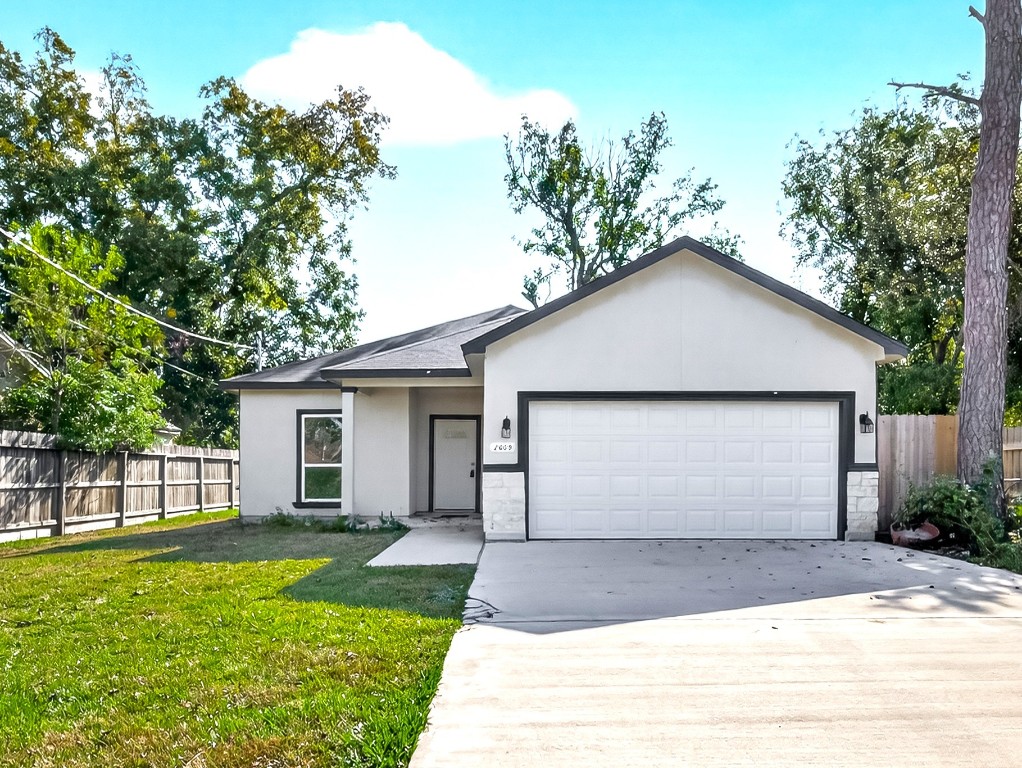 2609 Boss Street La Marque, TX 77568 - Photo 2 of 33 a front view of house with yard and garage