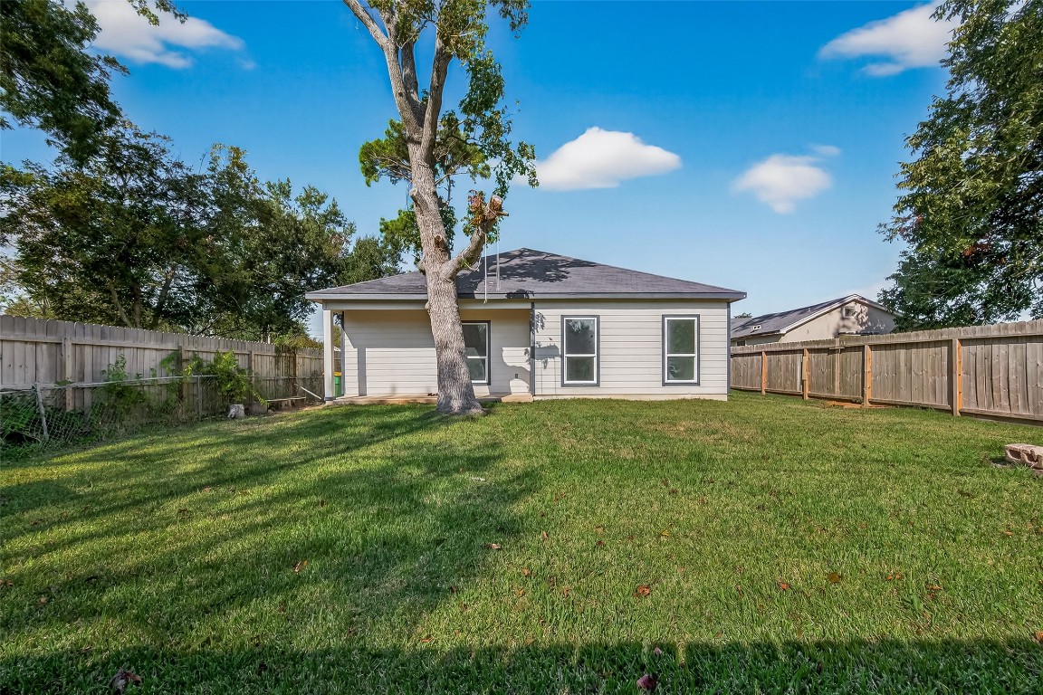 2609 Boss Street La Marque, TX 77568 - Photo 30 of 33 a view of a house with backyard and garden