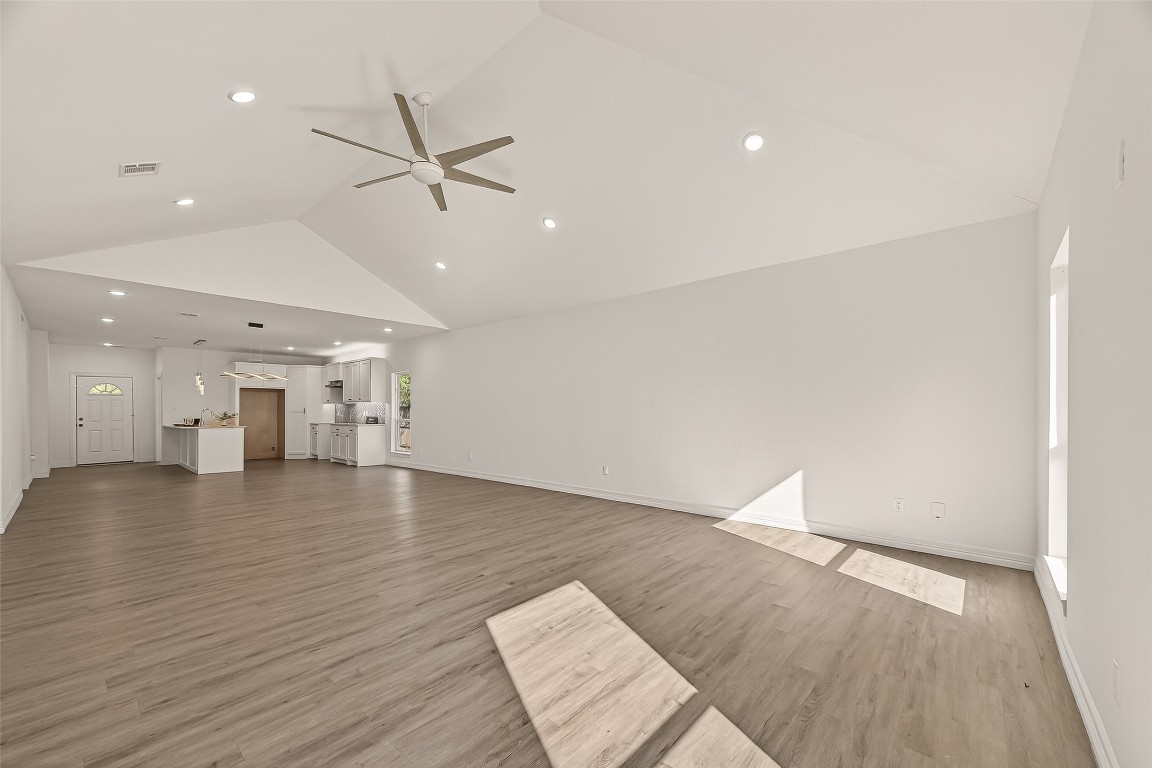 2609 Boss Street La Marque, TX 77568 - Photo 6 of 33 an empty room with wooden floor and windows