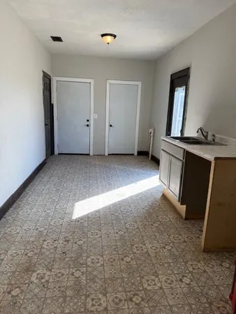 a view of a garage with furniture