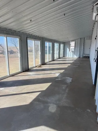 a view of an entryway with a livingroom