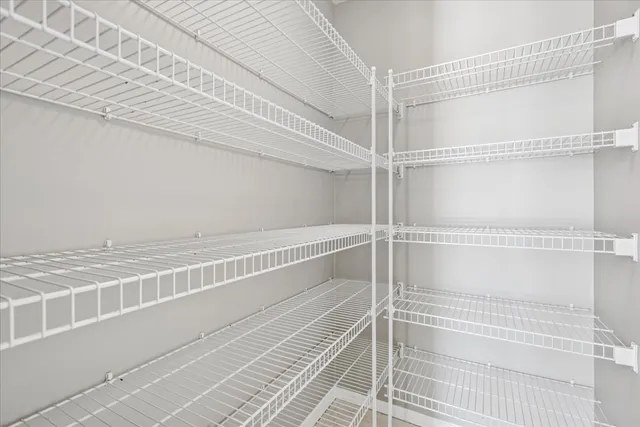 a view of a room with racks on the wall